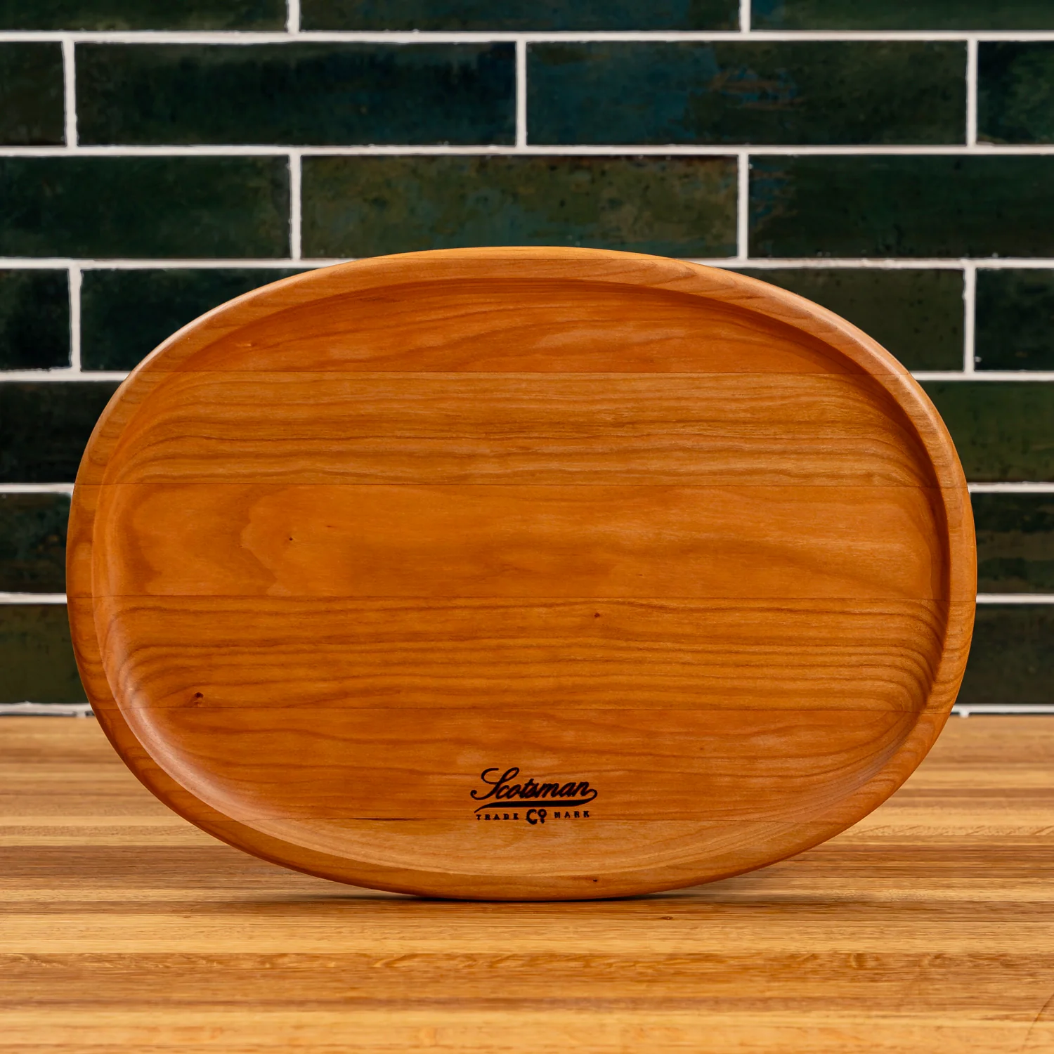 204-cherry-oval-carving-board-1.webp