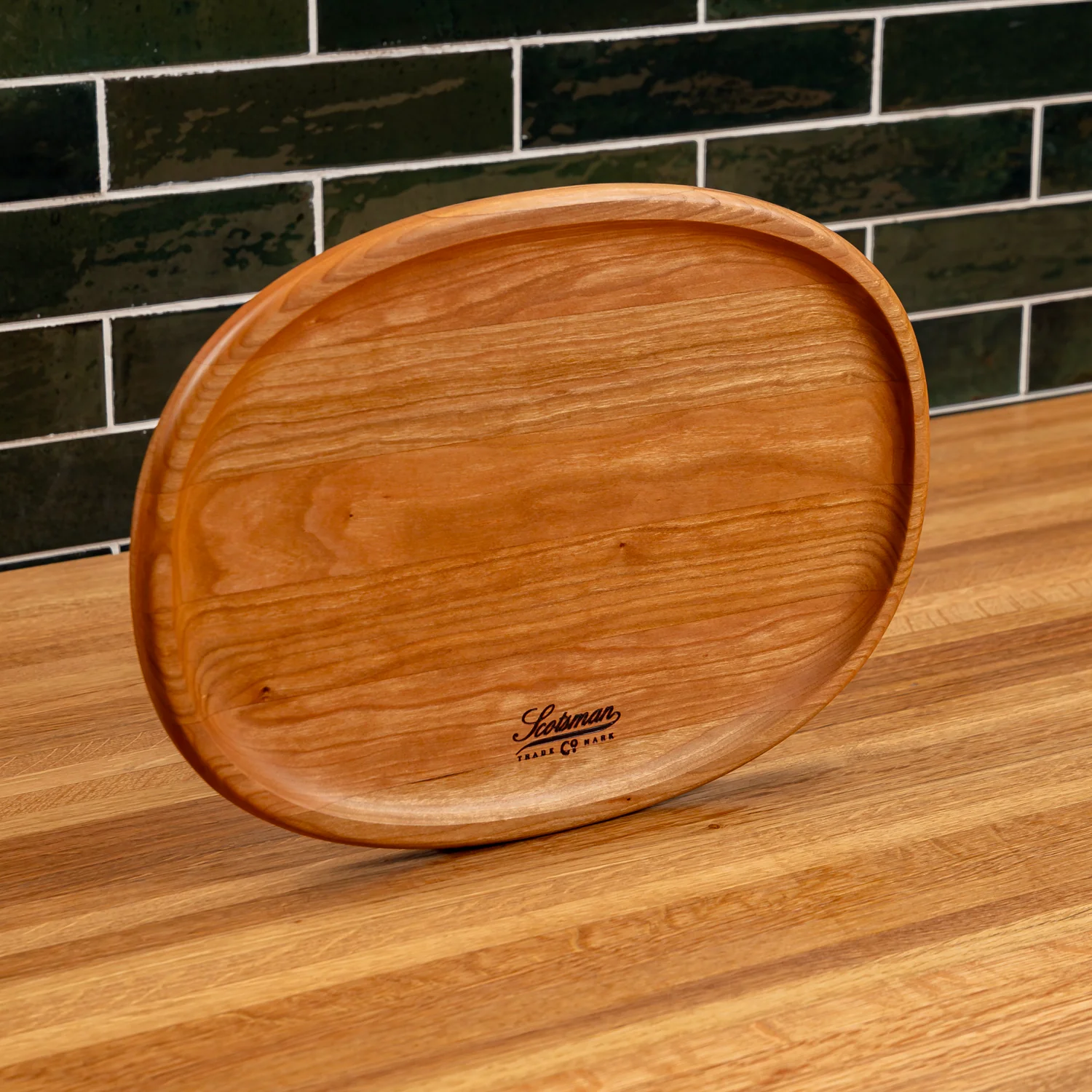 204-cherry-oval-carving-board-1.webp