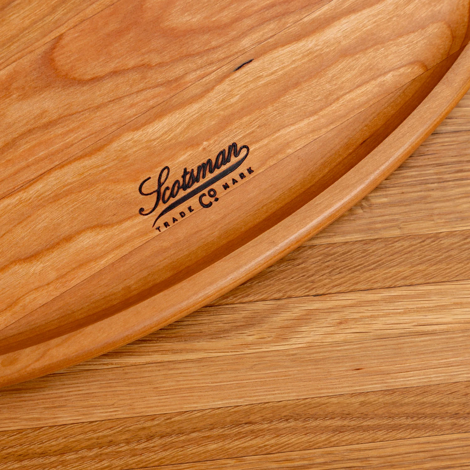 204-cherry-oval-carving-board-1.webp