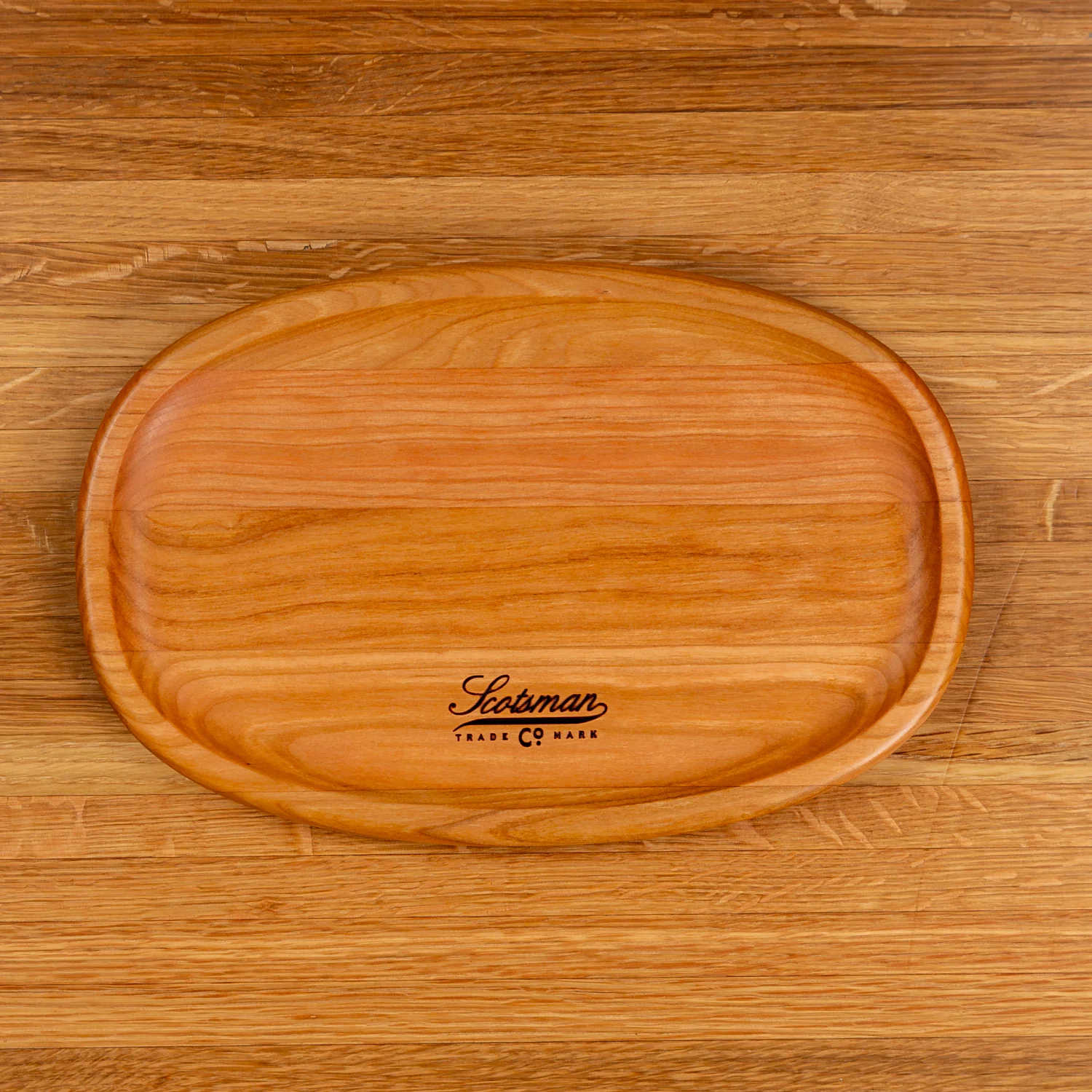 204-cherry-oval-carving-board-1.webp