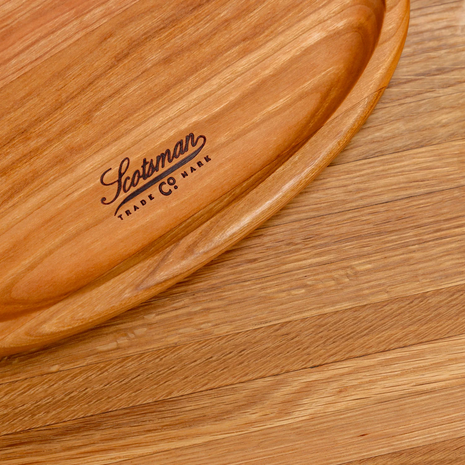 204-cherry-oval-carving-board-1.webp