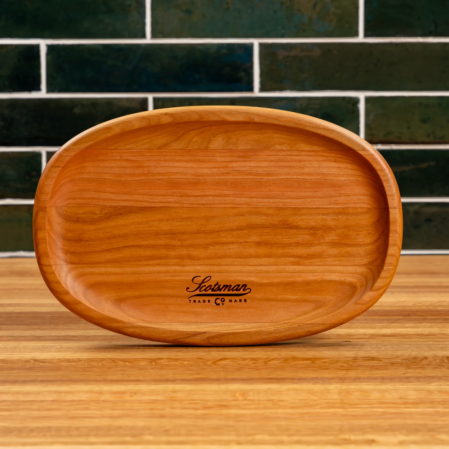204-cherry-oval-carving-board-1.webp