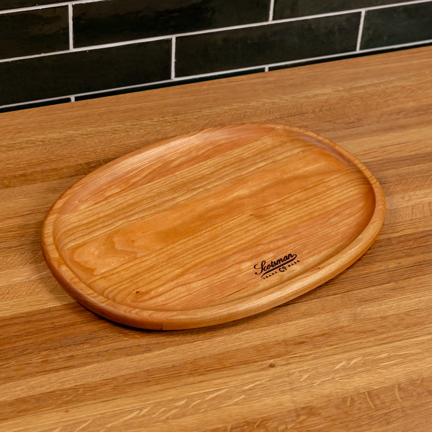 204-cherry-oval-carving-board-1.webp