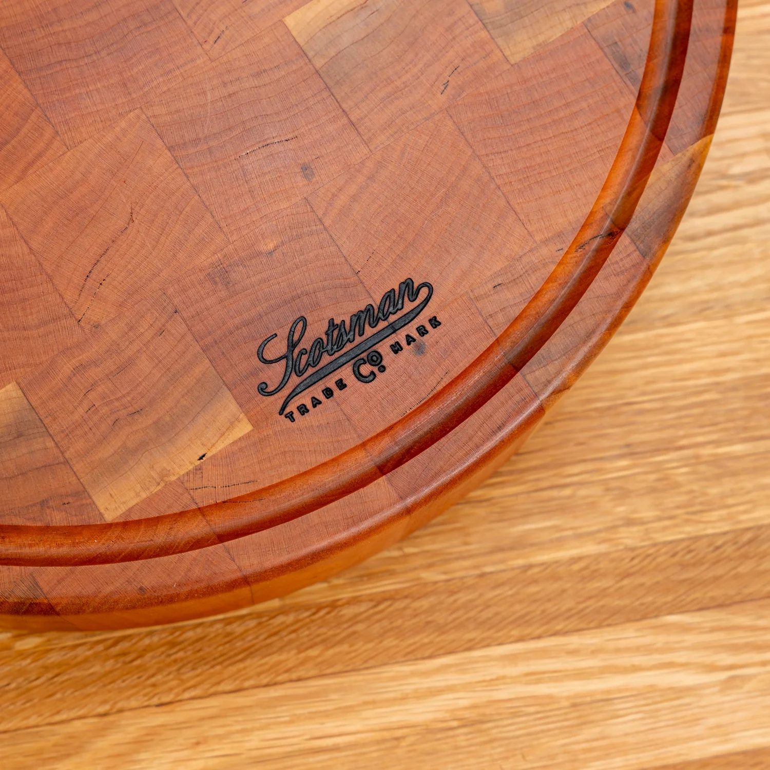 297-cherry-end-grain-round-butcher-block-with-juice-groove-1.webp