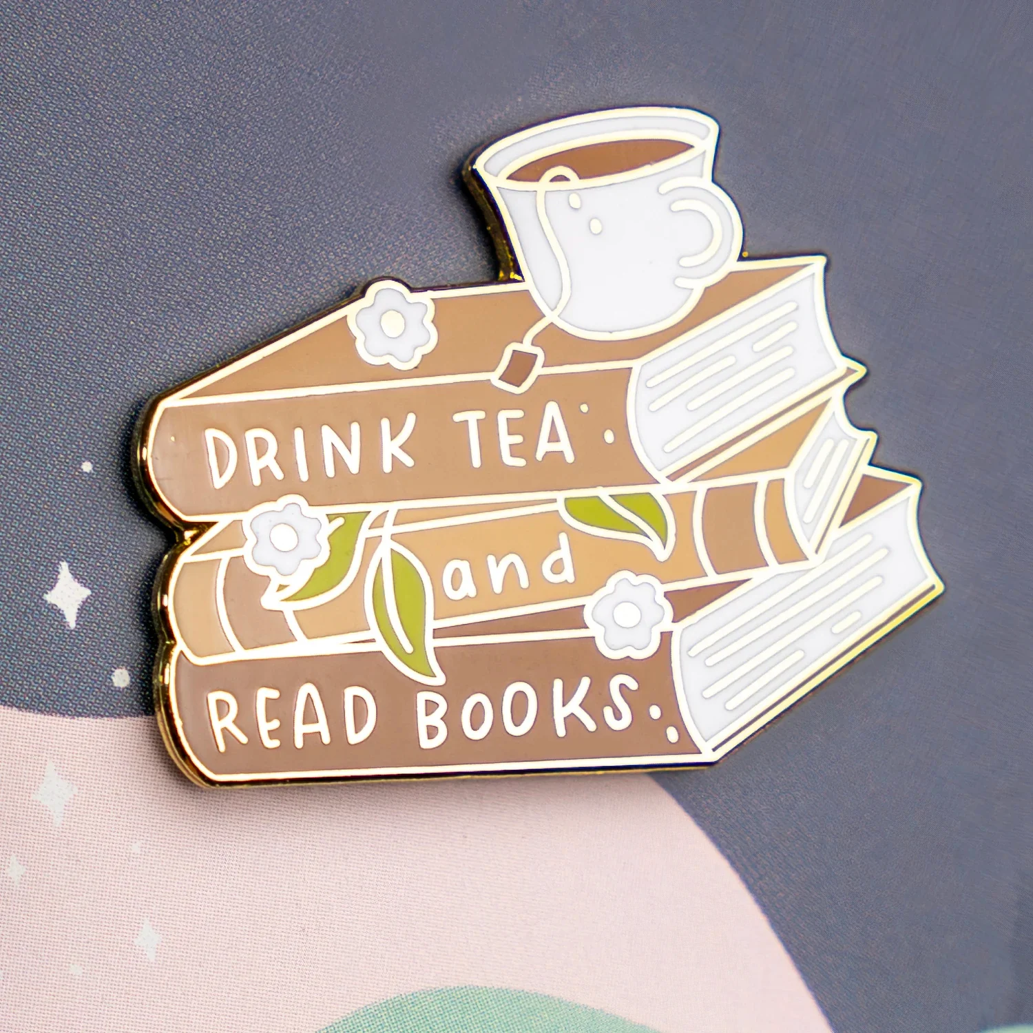 3641-tea-and-books-enamel-pin-1.webp
