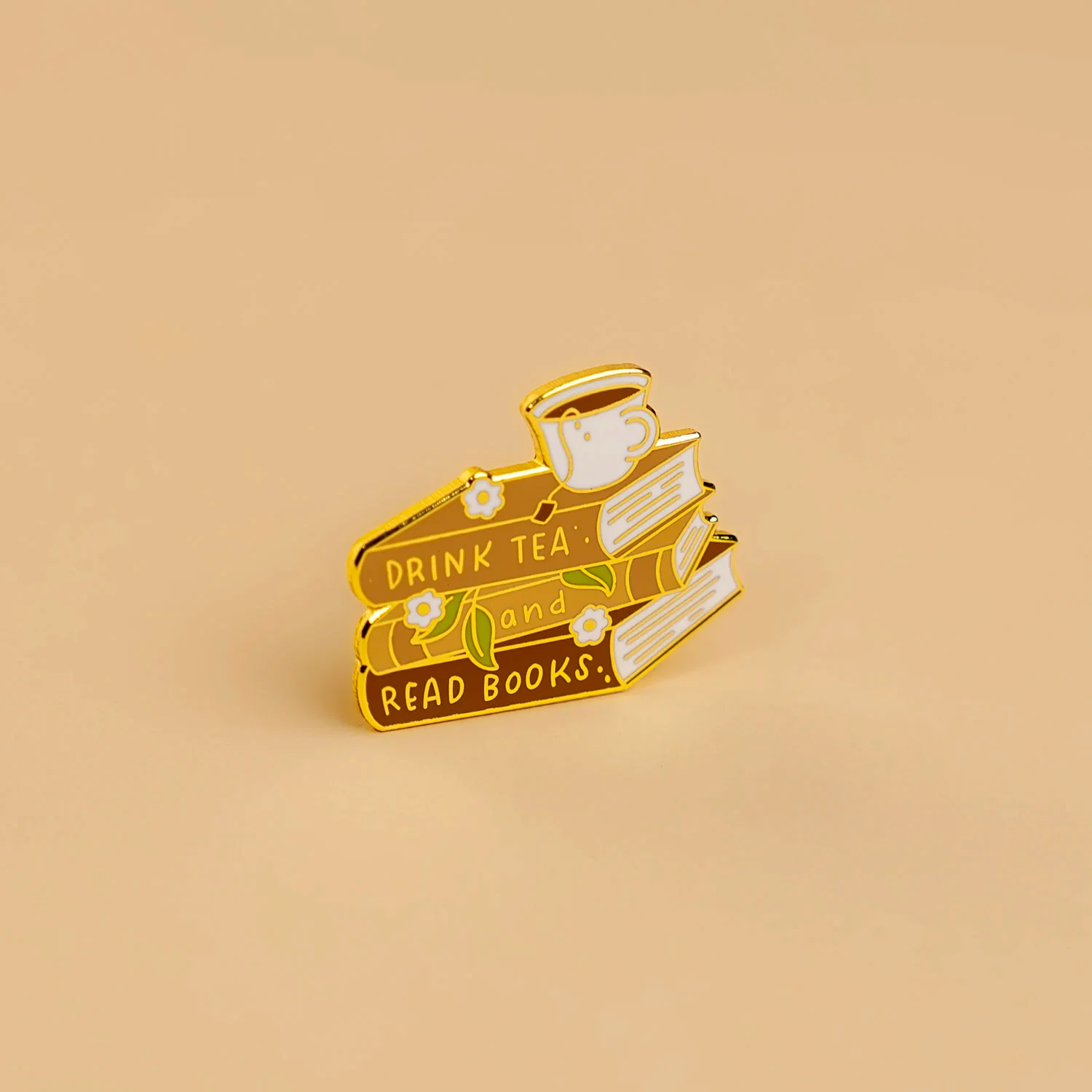 3641-tea-and-books-enamel-pin-1.webp