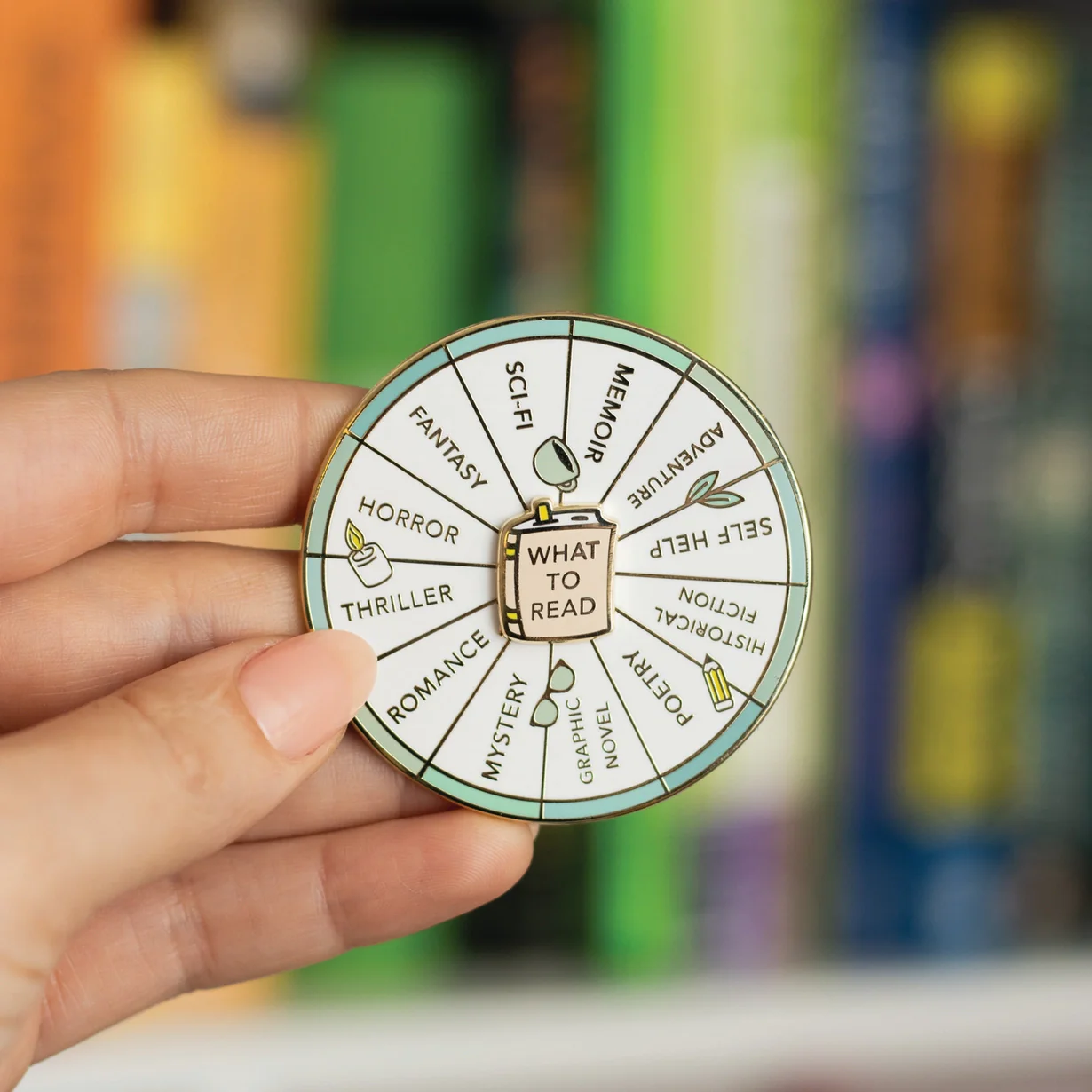 4206-what-to-read-spinning-enamel-pin-1.webp