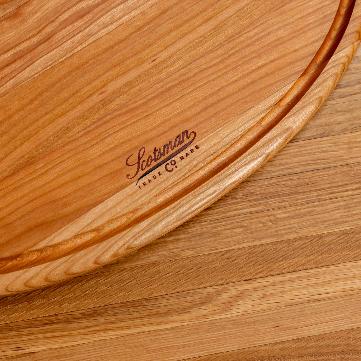 508-cherry-oval-serving-board-with-juice-groove-1.webp