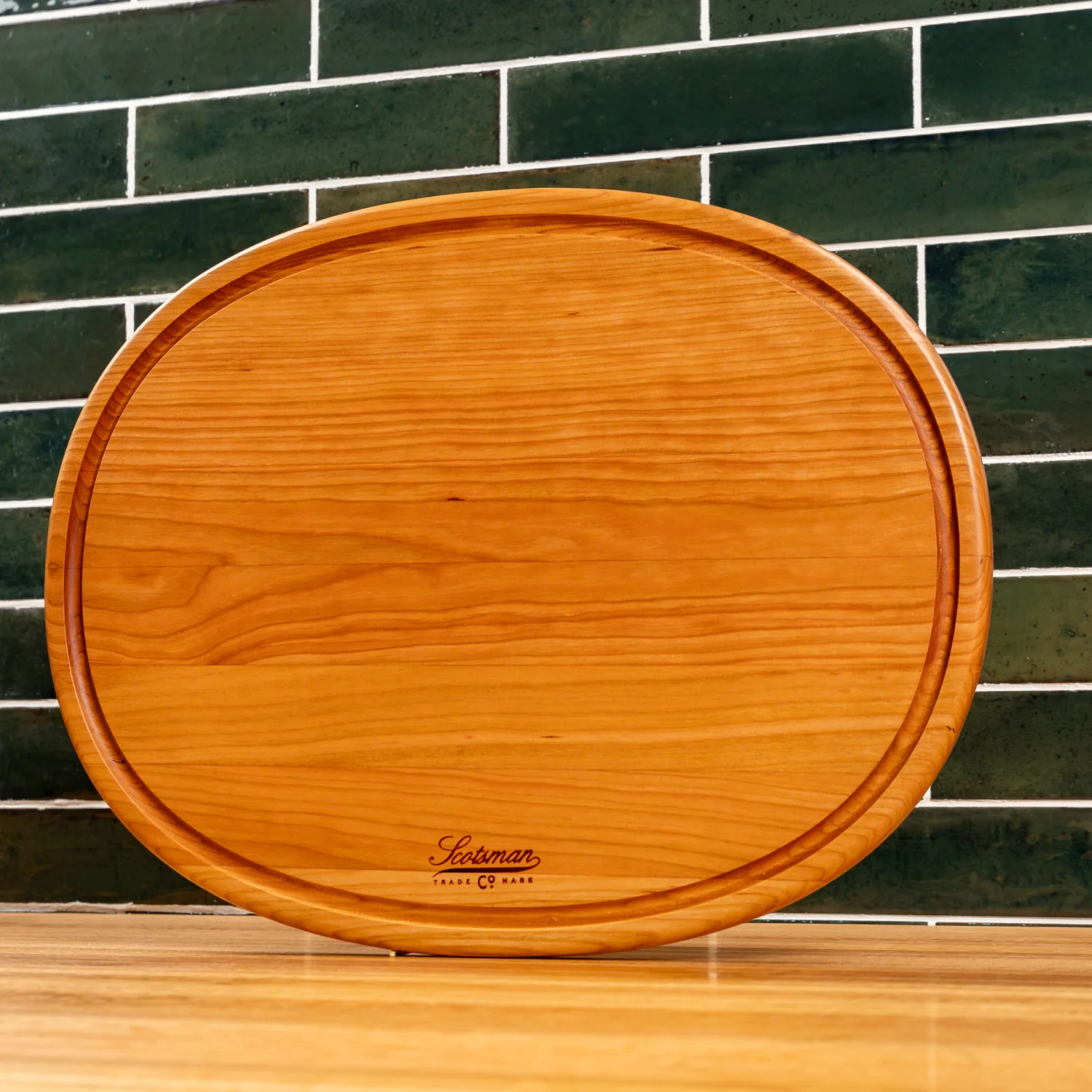 508-cherry-oval-serving-board-with-juice-groove-1.webp
