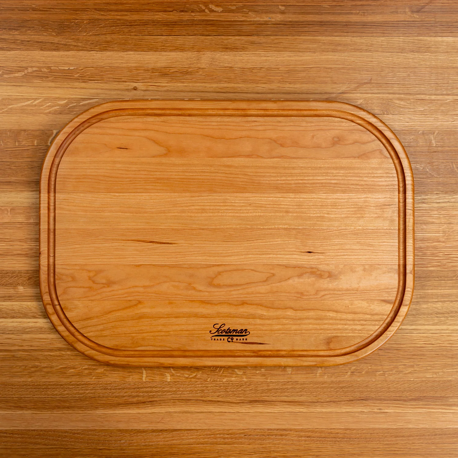 524-cherry-rectangle-serving-board-with-juice-groove-1.webp