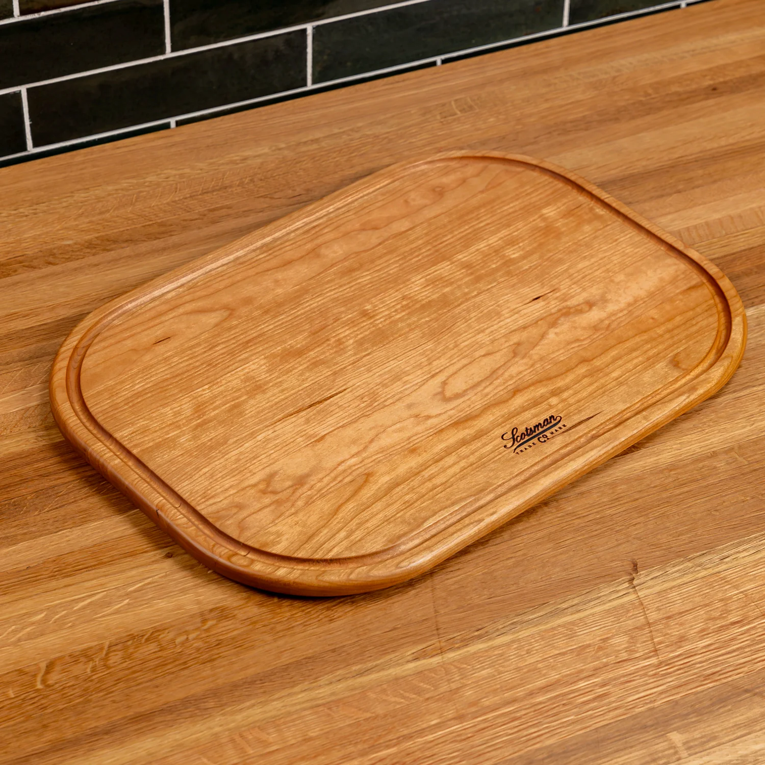 524-cherry-rectangle-serving-board-with-juice-groove-1.webp