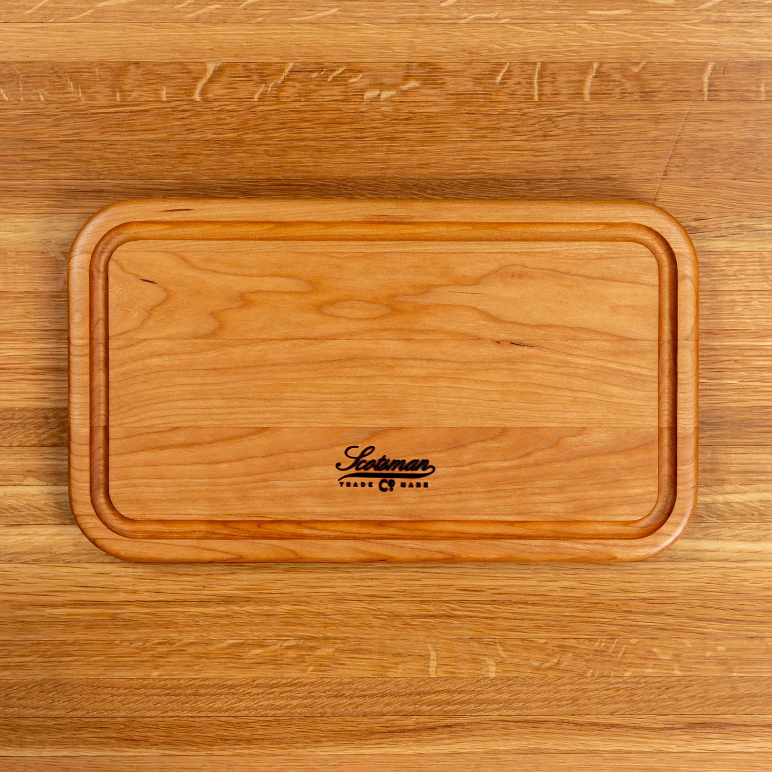 524-cherry-rectangle-serving-board-with-juice-groove-1.webp