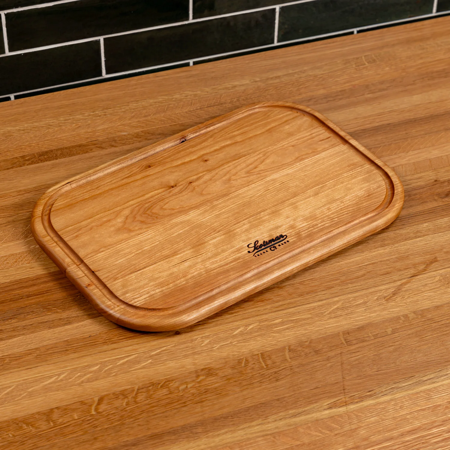 524-cherry-rectangle-serving-board-with-juice-groove-1.webp