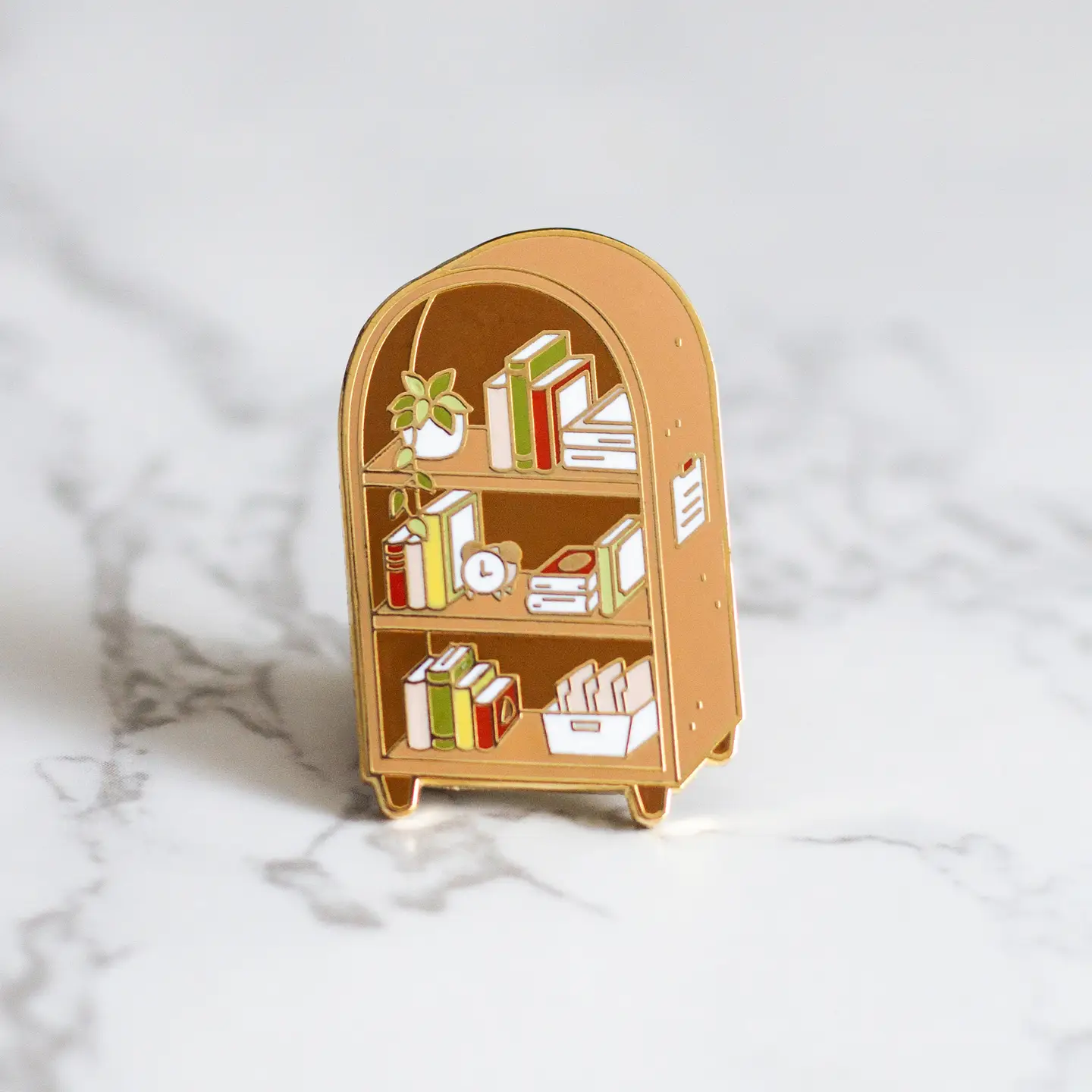 889-bookshelf-enamel-pin-1.webp